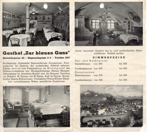 Historic interior with laid tables and cozy dining room in the inn.